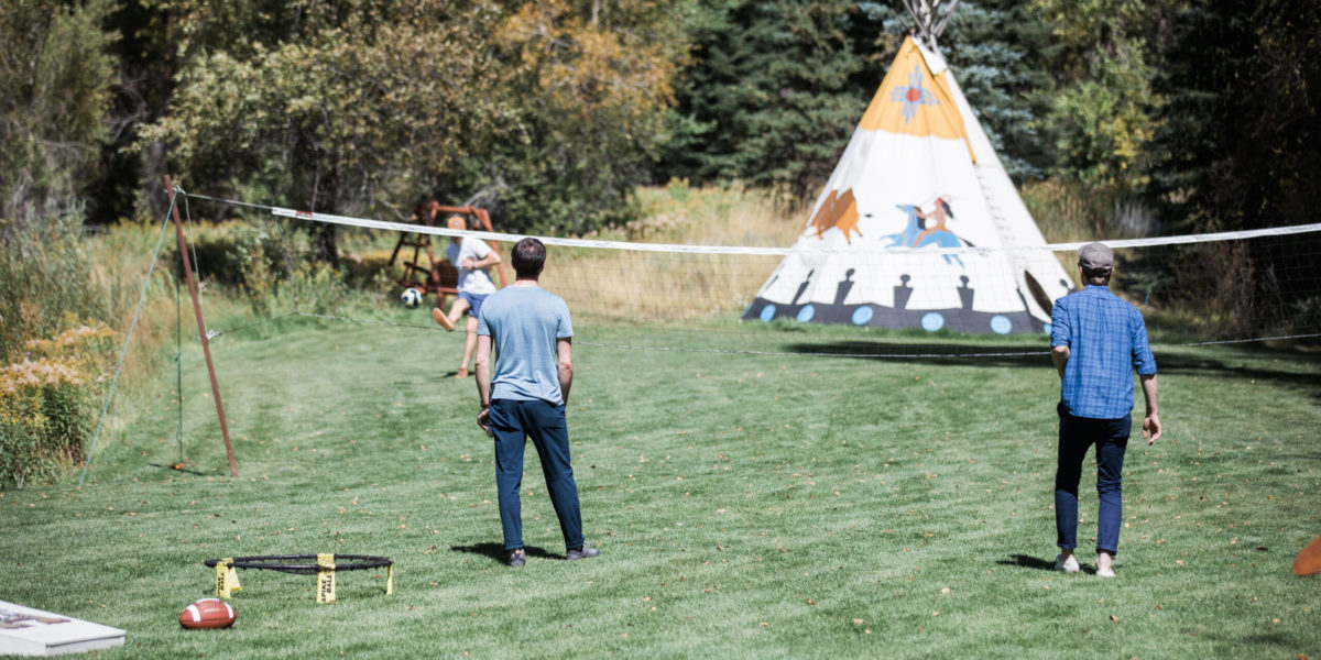 lawn_games_teepee A group of friends play lawn games in front of a teepee